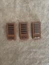 (3)LUTRON Homeworks STWD-5BRL-SI Keypad Button Replacements. Color/sienna (used). Fixed Price $35.00.