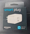 Amazon Wi Fi Smart Plug Power Outlet, In Electric Adapter, White. Fixed Price $12.00.