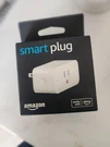 Amazon Smart Plug Wi-fi Alexa Compatible Indoor Use, 3-PRONG, White, 1 Outlet. Fixed Price $10.00.