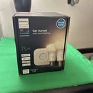 Philips Hue White Smart Lighting Starter Bridge Hub+ 2 A19 75W Alexa Homekit. Fixed Price $44.99.